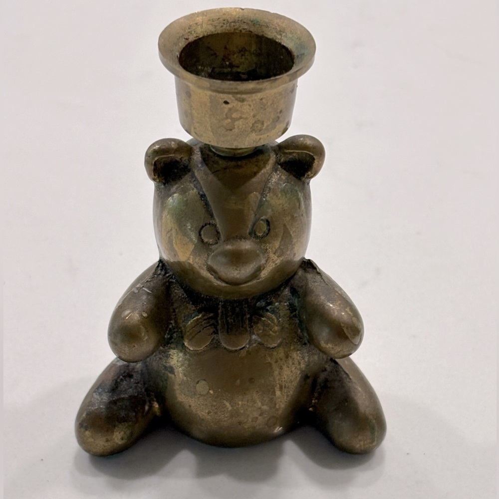 Bronze teddy bear candlestick holder